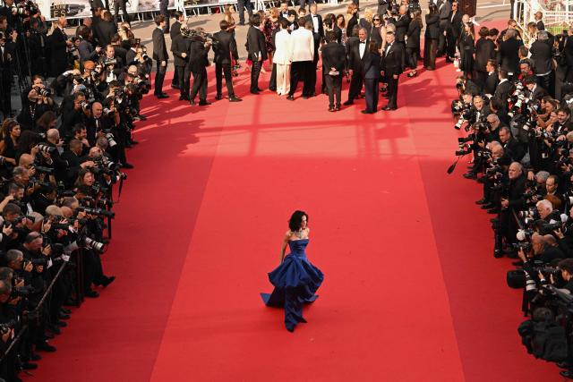 US actress Demi Moore arrives for the screening of the film "La Bola Negra" at the 79th edition of the Cannes Film Festival in Cannes, southern France on May 21, 2026. (Photo by Antonin THUILLIER / AFP)
