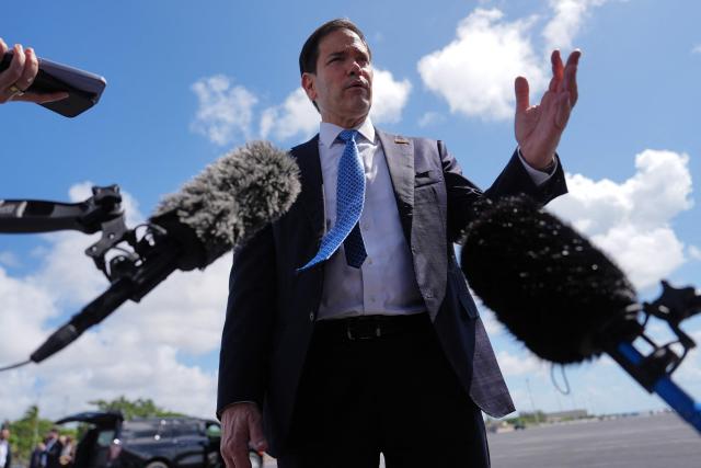 US Secretary of State Marco Rubio speaks to the press before boarding his plane at Homestead Air Reserve Base on May 21, 2026 in Homestead, Florida. Rubio is traveling to a NATO foreign ministers meeting in Sweden. (Photo by Julia Demaree Nikhinson / POOL / AFP)