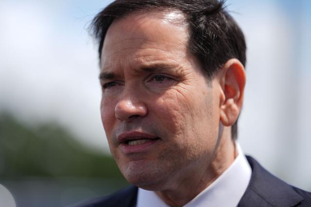 US Secretary of State Marco Rubio speaks to the press before boarding his plane at Homestead Air Reserve Base on May 21, 2026 in Homestead, Florida. Rubio is traveling to a NATO foreign ministers meeting in Sweden. (Photo by Julia Demaree Nikhinson / POOL / AFP)