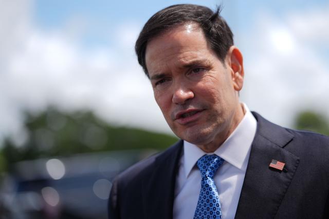 US Secretary of State Marco Rubio speaks to the press before boarding his plane at Homestead Air Reserve Base on May 21, 2026 in Homestead, Florida. Rubio is traveling to a NATO foreign ministers meeting in Sweden. (Photo by Julia Demaree Nikhinson / POOL / AFP)