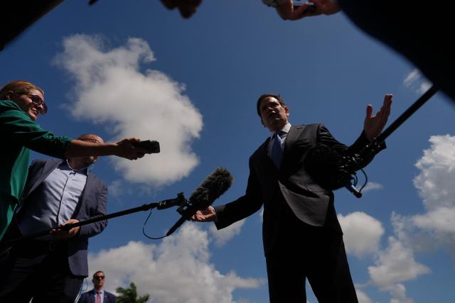 US Secretary of State Marco Rubio speaks to the press before boarding his plane at Homestead Air Reserve Base on May 21, 2026 in Homestead, Florida. Rubio is traveling to a NATO foreign ministers meeting in Sweden. (Photo by Julia Demaree Nikhinson / POOL / AFP)