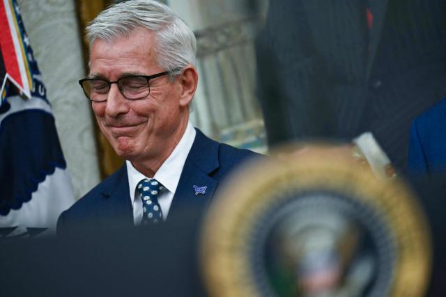 Greg Foran CEO of Kroger looks on during an announcement with US President Donald Trump and Environmental Protection Agency (EPA) Administrator Lee Zeldin in the Oval Office of the White House in Washington, DC on May 21, 2026. (Photo by Kent NISHIMURA / AFP)