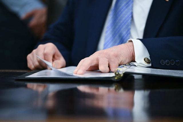 US President Donald Trump speaks during an announcement with Environmental Protection Agency (EPA) Administrator Lee Zeldin in the Oval Office of the White House in Washington, DC on May 21, 2026. (Photo by Kent NISHIMURA / AFP)