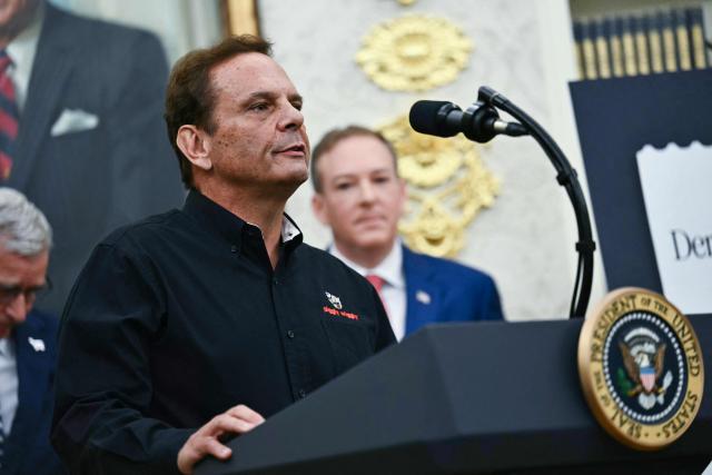 Kevin McDaniel CEO of Piggly Wiggly speaks as Environmental Protection Agency (EPA) Administrator Lee Zeldin (R) looks on during an announcement with US President Donald Trump in the Oval Office of the White House in Washington, DC on May 21, 2026. (Photo by Kent NISHIMURA / AFP)