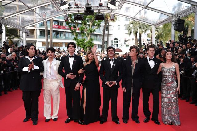 (From L) Venezuelan actor Carlos Gonzalez, actor Milo Quifes, Spanish director, screenwriter and producer Javier Calvo, Spanish actress Penelope Cruz, Spanish director, screenwriter and producer Javier Ambrossi, Spanish singer-songwriter and guitarist Alvaro Lafuente Calvo, Spanish actor Miguel Bernardeau and Spanish actress Lola Duenas arrive for the screening of the film "La Bola Negra" at the 79th edition of the Cannes Film Festival in Cannes, southern France on May 21, 2026. (Photo by Sameer AL-DOUMY / AFP)