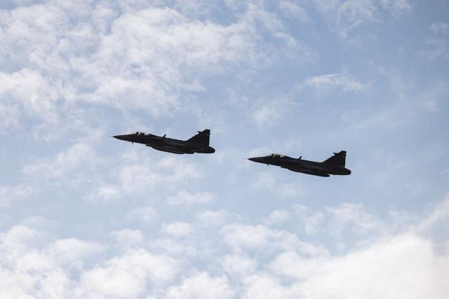 Swedish Air Force Saab Gripen fighter jets fly over Helsingborg, Sweden, on May 21, 2026, during the Meeting of NATO Ministers of Foreign Affairs taking place on May 21-22. NATO foreign ministers gather in Helsingborg on May 21-22 for talks focused on security, defence cooperation and regional stability. (Photo by Jonathan NACKSTRAND / AFP)