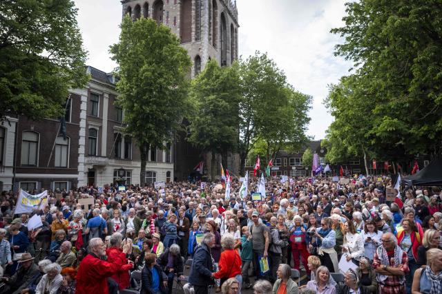 Demonstrators take part at a rally in solidarity with refugees and in response to recent protests against asylum seeker centers in The Netherlands, in Utrecht on May 21, 2026. (Photo by Jeroen Jumelet / ANP / AFP) / Netherlands OUT