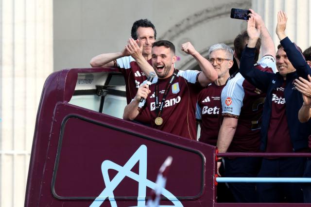 Aston Villa's Scottish midfielder  #07 John McGinn celebrates on the bus during the team's trophy parade, the day after their team won the Europa League, in Birmingham, central England on May 21, 2026. Aston Villa's win in the Europa League puts an end to their 30-year trophy drought. (Photo by Darren Staples / AFP)