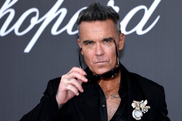British singer-Songwriter Robbie Williams attends the annual American Foundation for AIDS Research amfAR Gala Cannes 2026 at the Hotel du Cap-Eden-Roc in Cap d'Antibes, southern France, on the sidelines of the 79th edition of the Cannes Film Festival on May 21, 2026. (Photo by Thibaud MORITZ / AFP)