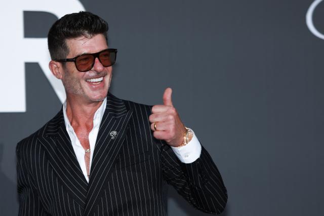 US singer Robin Thicke attends the annual American Foundation for AIDS Research amfAR Gala Cannes 2026 at the Hotel du Cap-Eden-Roc in Cap d'Antibes, southern France, on the sidelines of the 79th edition of the Cannes Film Festival on May 21, 2026. (Photo by Julie SEBADELHA / AFP)