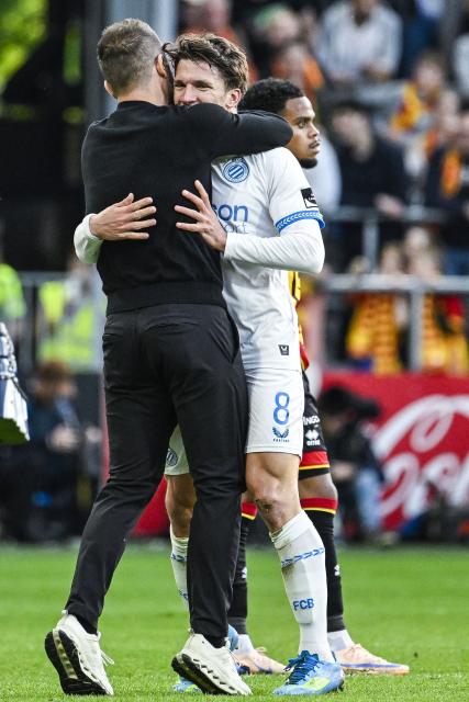 CORRECTION / Club Brugge's Greek forward #08 Christos Tzolis (R) celebrates scoring his team's first goal with Club's Croatian head coach Ivan Leko during the Belgian "Pro League" First Division football match between KV Mechelen and Club Brugge at Achter De Kazerne stadium in Mechelen on May 21, 206. (Photo by Tom Goyvaerts / BELGA / AFP) / Belgium OUT / The erroneous mention[s] appearing in the metadata of this photo by Tom Goyvaerts has been modified in AFP systems in the following manner: [Club Brugge's Greek forward #08 Christos Tzolis ] instead of [Club Brugge's Italian forward #07 Nicolo Tresoldi]. Please immediately remove the erroneous mention[s] from all your online services and delete it (them) from your servers. If you have been authorized by AFP to distribute it (them) to third parties, please ensure that the same actions are carried out by them. Failure to promptly comply with these instructions will entail liability on your part for any continued or post notification usage. Therefore we thank you very much for all your attention and prompt action. We are sorry for the inconvenience this notification may cause and remain at your disposal for any further information you may require.