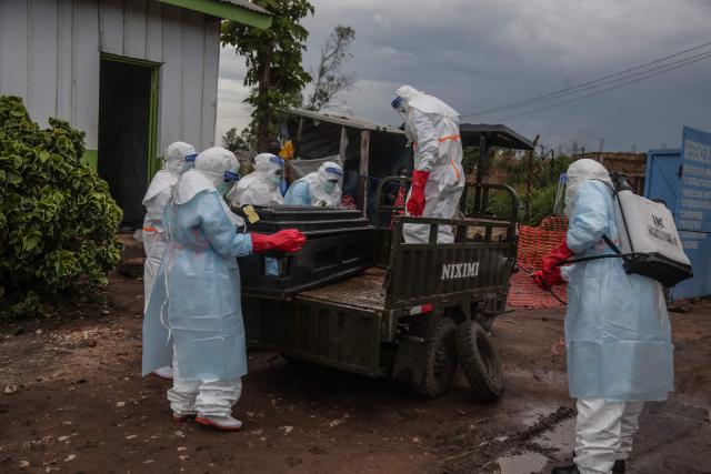 Medical staff wearing personal protective equipment (PPE) spray with disinfectant a tricycle transporting the body of a patient deceased at the hospital in Rwampara on May 21, 2026. According to the WHO, the latest outbreak in the DRC, the 17th to hit the vast central African country of more than 100 million people, is already suspected of having caused 139 deaths out of nearly 600 probable cases.
Many of the cases have been recorded in the epidemic's epicentre in the DRC's northeastern Ituri province, many in hard-to-access areas plagued by the Congolese east's litany of armed groups. (Photo by Seros MUYISA / AFP)