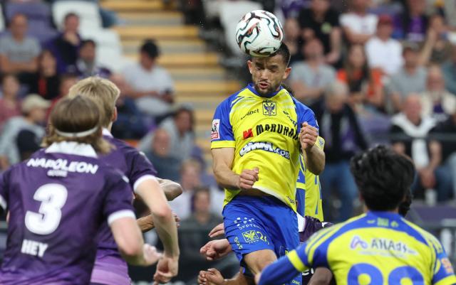 STVV's North Macedonian defender #26 Visar Musliu heads the ball during the Belgian Proleague Champion's Play-off football match between RSC Anderlecht and Sint-Truidense VV, in Brussels on May 21, 2026. (Photo by VIRGINIE LEFOUR / Belga / AFP) / Belgium OUT