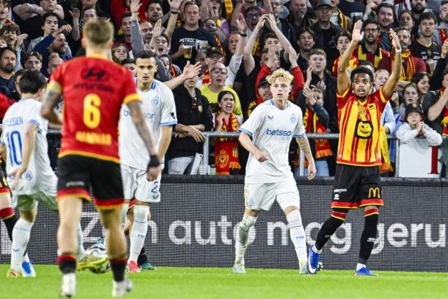 Mechelen's French defender #07 Therence Koudou (R) reacts during the Belgian "Pro League" First Division football match between KV Mechelen and Club Brugge at Achter De Kazerne stadium in Mechelen on May 21, 206. (Photo by Tom Goyvaerts / BELGA / AFP) / Belgium OUT