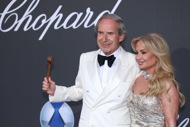 Swiss auctioneer and art dealer Simon de Pury and his wife Michaela Neumeister attend the annual American Foundation for AIDS Research amfAR Gala Cannes 2026 at the Hotel du Cap-Eden-Roc in Cap d'Antibes, southern France, on the sidelines of the 79th edition of the Cannes Film Festival on May 21, 2026. (Photo by Thibaud MORITZ / AFP)