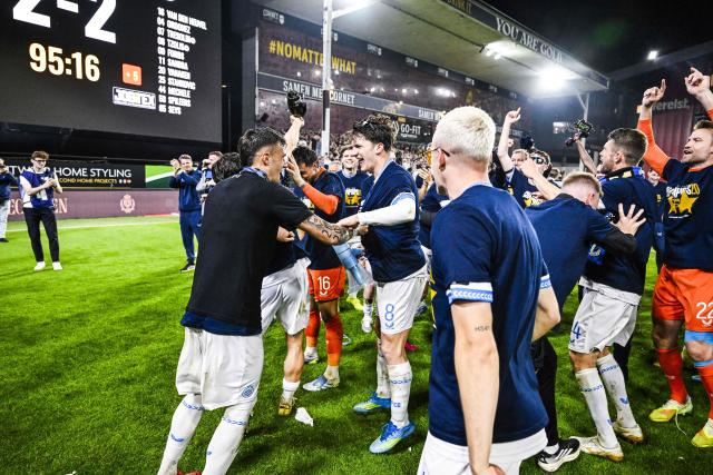 Club's players celebrate winning the championship title after the Belgian Pro League play-off football match between KV Mechelen and Club Brugge at Achter De Kazerne stadium in Mechelen on May 21, 2026. (Photo by Tom Goyvaerts / BELGA / AFP) / Belgium OUT