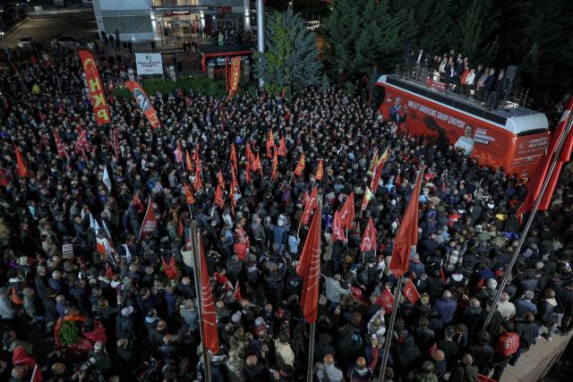 Ozgur Ozel (top R), Leader of Republican People's Party (CHP) addresses a speech at their party headquarters during a protest against allegations of vote buying at the CHP congress in November 2023, in Ankara, on May 21, 2026. An Ankara court on May 21 annulled the 2023 leadership election of Turkey's main opposition CHP party, state news agency Anadolu reported, in a sharp escalation against the country's embattled opposition. The ruling overturns the result of the leadership election that brought in current party head Ozgur Ozel -- and ordered that the party's former longterm chair, Kemal Kilicdaroglu -- who lost the election to Ozel -- take over as interim leader. (Photo by ADEM ALTAN / AFP)
