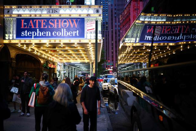 The exterior of the Ed Sullivan Theater is seen after the taping of the final episode of the "The Late Show" after 32 years on air, in New York, on May 21, 2026. "The Late Show" frontman Stephen Colbert will host the final edition of the 33-year-old US cultural institution on May 21, after it was cancelled by CBS as the network courted President Donald Trump. The show, which Colbert has hosted since 2015, was axed after he mocked the broadcaster for a $16 million settlement with Trump for allegedly "maliciously" editing an interview with his Democratic election rival Kamala Harris. (Photo by CHARLY TRIBALLEAU / AFP)