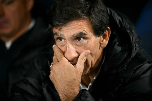 Racing's head coach Gustavo Costas gestures before the Copa Sudamericana group stage football match between Argentina's Racing Club and Venezuela's Caracas FC at Presidente Peron 'El Cilindro' stadium in Avellaneda, Buenos Aires province, Argentina on May 21, 2026. (Photo by Luis ROBAYO / AFP)