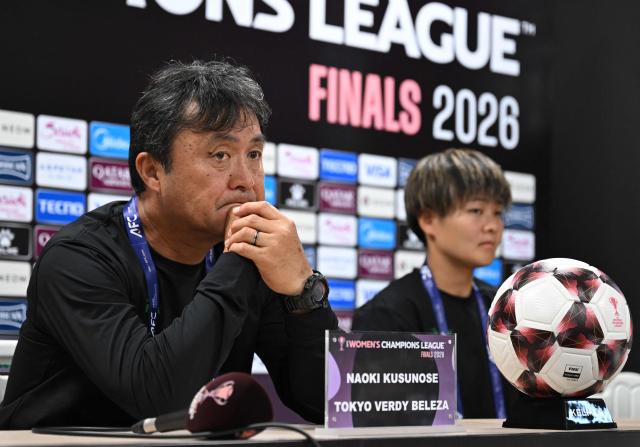 Japan's Tokyo Verdy Beleza head coach Naoki Kusunose (L) and his player Tomoko Muramatsu (R) attend a press conference at Suwon Sports Complex in Suwon on May 22, 2026, ahead of the AFC Women's Champions League final football match. (Photo by Jung Yeon-je / AFP)