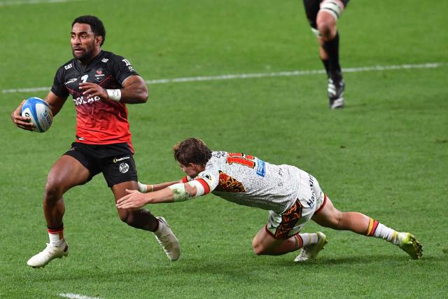 Crusaders' Sevu Reece (L) is tackled by Chiefs' Isaac Hutchinson during the Super Rugby Pacific match between the Crusaders and Chiefs at One New Zealand Stadium in Christchurch on May 22, 2026. (Photo by Sanka Vidanagama / AFP)