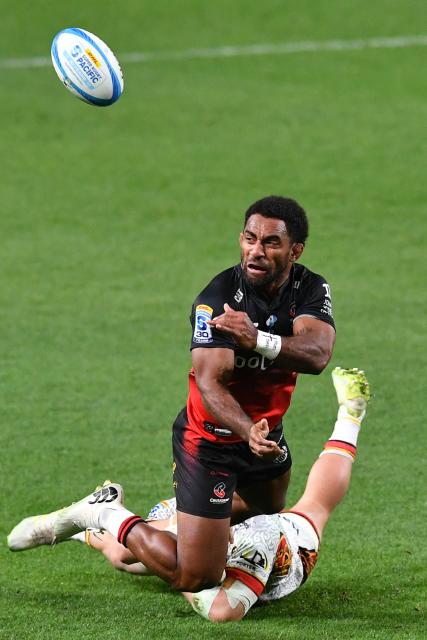 Crusaders' Sevu Reece (L) is tackled by Chiefs' Isaac Hutchinson during the Super Rugby Pacific match between the Crusaders and Chiefs at One New Zealand Stadium in Christchurch on May 22, 2026. (Photo by Sanka Vidanagama / AFP)
