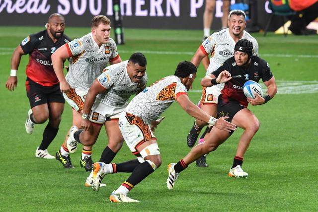 Crusaders' Will Jordan (R) charges forward during the Super Rugby Pacific match between the Crusaders and Chiefs at One New Zealand Stadium in Christchurch on May 22, 2026. (Photo by Sanka Vidanagama / AFP)