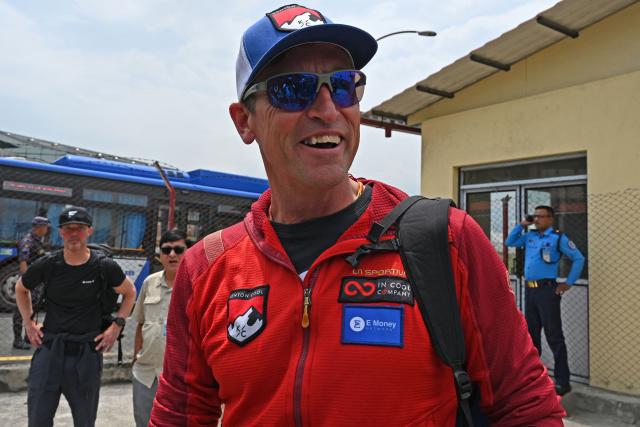 (FILES) British climber Kenton Cool arrives at the airport in Kathmandu on May 20, 2025. British climber Kenton Cool reached the top of Mount Everest for the 20th time on May 22, 2026 extending his own record for the most ascents of the world's highest peak by a non-Nepali. (Photo by Prakash MATHEMA / AFP)