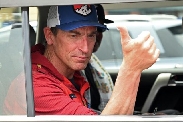 (FILES) British climber Kenton Cool gestures from a car upon his arrival at the airport in Kathmandu on May 20, 2025. Cool reached the top of Mount Everest for the 20th time on May 22, 2026 extending his own record for the most ascents of the world's highest peak by a non-Nepali. (Photo by Prakash MATHEMA / AFP)