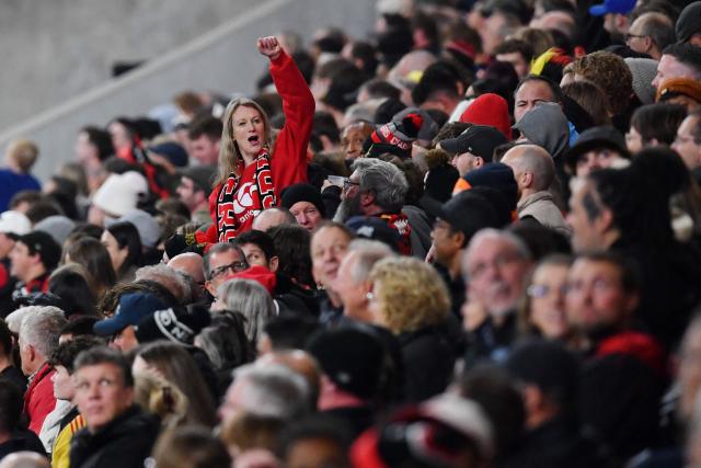 Fans cheer  during the Super Rugby Pacific match between the Canterbury Crusaders and Waikato Chiefs at One New Zealand Stadium in Christchurch on May 22, 2026. (Photo by Sanka Vidanagama / AFP)