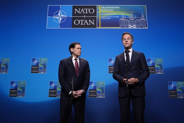 NATO Secretary General Mark Rutte (R) and US Secretary of State Marco Rubio give remarks at the NATO Foreign Ministers' meeting in Helsingborg, Sweden, on May 22, 2026. Foreign ministers of the 32 NATO member states gathered in the Swedish city to finalise preparations for the upcoming Ankara Summit. (Photo by Julia Demaree Nikhinson / AFP)