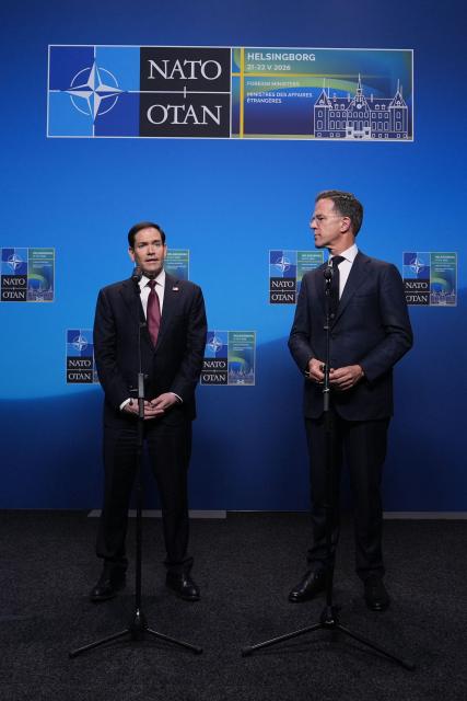 NATO Secretary General Mark Rutte (R) and US Secretary of State Marco Rubio give remarks at the NATO Foreign Ministers' meeting in Helsingborg, Sweden, on May 22, 2026. Foreign ministers of the 32 NATO member states gathered in the Swedish city to finalise preparations for the upcoming Ankara Summit. (Photo by Julia Demaree Nikhinson / POOL / AFP) / Sweden OUT