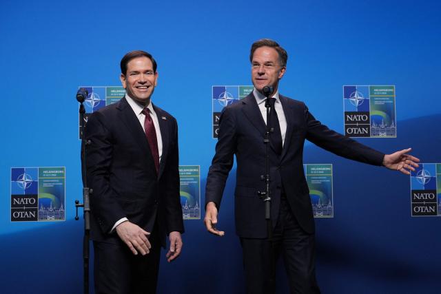 NATO Secretary General Mark Rutte (R) and US Secretary of State Marco Rubio walk off the podium after giving remarks at the NATO Foreign Ministers' meeting in Helsingborg, Sweden, on May 22, 2026. Foreign ministers of the 32 NATO member states gathered in the Swedish city to finalise preparations for the upcoming Ankara Summit. (Photo by Julia Demaree Nikhinson / POOL / AFP)