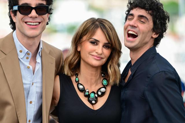 Spanish director, screenwriter and producer Javier Calvo, Spanish actress Penelope Cruz and Spanish director, screenwriter and producer Javier Ambrossi pose during a photocall of the film "La Bola Negra" at the 79th edition of the Cannes Film Festival in Cannes, southern France on May 22, 2026. (Photo by Olivier CHASSIGNOLE / AFP)