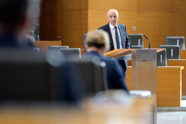 Right-wing Slovenian Democratic Party (SDS) leader Janez Jansa addresses members of the National Assembly ahead of his investiture vote as Prime minister in Ljubljana on May 22, 2026. Jansa, 67, said on May 18, 2026 his Slovenian Democratic Party (SDS) had reached a coalition deal with two centre-right parties -- Christian democratic party Nova Slovenija and his former close ally Anze Logar's Democrats -- giving them 43 out of 90 seats in parliament. If confirmed, Jansa would begin a fourth term as prime minister, two months after Slovenia's inconclusive March 22 parliamentary election in which his party and outgoing Prime Minister Robert Golob's Freedom Movement finished virtually tied. (Photo by Jure Makovec / AFP)