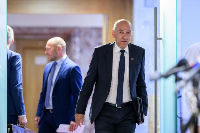 Right-wing Slovenian Democratic Party (SDS) leader Janez Jansa arrives to address members of the National Assembly ahead of his investiture vote as prime minister in Ljubljana on May 22, 2026. Jansa, 67, said on May 18, 2026 his Slovenian Democratic Party (SDS) had reached a coalition deal with two centre-right parties -- Christian democratic party Nova Slovenija and his former close ally Anze Logar's Democrats -- giving them 43 out of 90 seats in parliament. If confirmed, Jansa would begin a fourth term as prime minister, two months after Slovenia's inconclusive March 22 parliamentary election in which his party and outgoing Prime Minister Robert Golob's Freedom Movement finished virtually tied. (Photo by Jure Makovec / AFP)