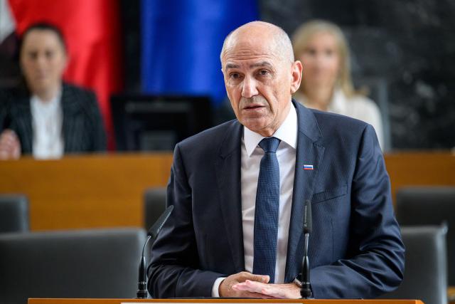Right-wing Slovenian Democratic Party (SDS) leader Janez Jansa addresses members of the National Assembly ahead of his investiture vote as Prime minister in Ljubljana on May 22, 2026. Jansa, 67, said on May 18, 2026 his Slovenian Democratic Party (SDS) had reached a coalition deal with two centre-right parties -- Christian democratic party Nova Slovenija and his former close ally Anze Logar's Democrats -- giving them 43 out of 90 seats in parliament. If confirmed, Jansa would begin a fourth term as prime minister, two months after Slovenia's inconclusive March 22 parliamentary election in which his party and outgoing Prime Minister Robert Golob's Freedom Movement finished virtually tied. (Photo by Jure Makovec / AFP)