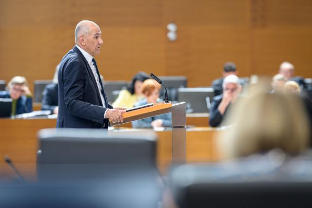 Right-wing Slovenian Democratic Party (SDS) leader Janez Jansa addresses members of the National Assembly ahead of his investiture vote as Prime minister in Ljubljana on May 22, 2026. Jansa, 67, said on May 18, 2026 his Slovenian Democratic Party (SDS) had reached a coalition deal with two centre-right parties -- Christian democratic party Nova Slovenija and his former close ally Anze Logar's Democrats -- giving them 43 out of 90 seats in parliament. If confirmed, Jansa would begin a fourth term as prime minister, two months after Slovenia's inconclusive March 22 parliamentary election in which his party and outgoing Prime Minister Robert Golob's Freedom Movement finished virtually tied. (Photo by Jure Makovec / AFP)