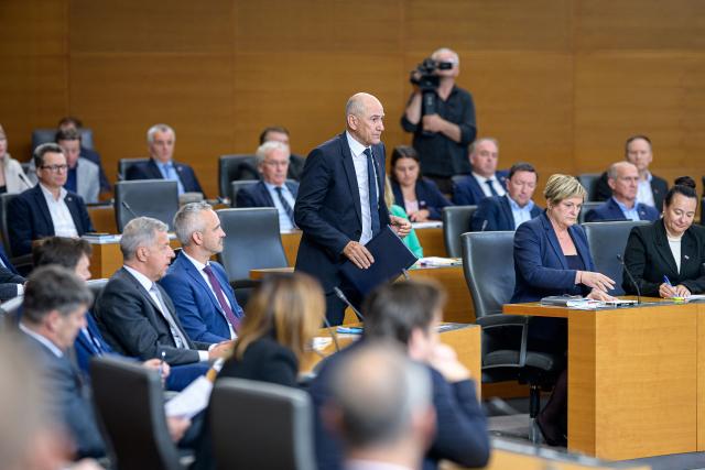 Right-wing Slovenian Democratic Party (SDS) leader Janez Jansa arrives to address members of the National Assembly ahead of his investiture vote as prime minister in Ljubljana on May 22, 2026. Jansa, 67, said on May 18, 2026 his Slovenian Democratic Party (SDS) had reached a coalition deal with two centre-right parties -- Christian democratic party Nova Slovenija and his former close ally Anze Logar's Democrats -- giving them 43 out of 90 seats in parliament. If confirmed, Jansa would begin a fourth term as prime minister, two months after Slovenia's inconclusive March 22 parliamentary election in which his party and outgoing Prime Minister Robert Golob's Freedom Movement finished virtually tied. (Photo by Jure Makovec / AFP)