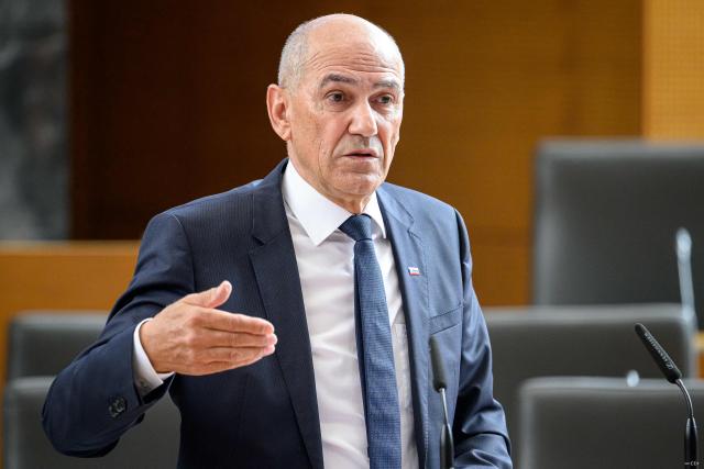 Right-wing Slovenian Democratic Party (SDS) leader Janez Jansa addresses members of the National Assembly ahead of his investiture vote as Prime minister in Ljubljana on May 22, 2026. Jansa, 67, said on May 18, 2026 his Slovenian Democratic Party (SDS) had reached a coalition deal with two centre-right parties -- Christian democratic party Nova Slovenija and his former close ally Anze Logar's Democrats -- giving them 43 out of 90 seats in parliament. If confirmed, Jansa would begin a fourth term as prime minister, two months after Slovenia's inconclusive March 22 parliamentary election in which his party and outgoing Prime Minister Robert Golob's Freedom Movement finished virtually tied. (Photo by Jure Makovec / AFP)