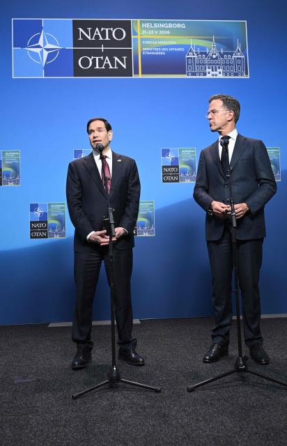 NATO Secretary General Mark Rutte (R) and US Secretary of State Marco Rubio give remarks at the NATO Foreign Ministers' meeting in Helsingborg, Sweden, on May 22, 2026. Foreign ministers of the 32 NATO member states gathered in the Swedish city to finalise preparations for the upcoming Ankara Summit. (Photo by Jonathan Nackstrand / AFP)