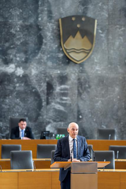 Right-wing Slovenian Democratic Party (SDS) leader Janez Jansa addresses members of the National Assembly ahead of his investiture vote as Prime minister in Ljubljana on May 22, 2026. Jansa, 67, said on May 18, 2026 his Slovenian Democratic Party (SDS) had reached a coalition deal with two centre-right parties -- Christian democratic party Nova Slovenija and his former close ally Anze Logar's Democrats -- giving them 43 out of 90 seats in parliament. If confirmed, Jansa would begin a fourth term as prime minister, two months after Slovenia's inconclusive March 22 parliamentary election in which his party and outgoing Prime Minister Robert Golob's Freedom Movement finished virtually tied. (Photo by Jure Makovec / AFP)