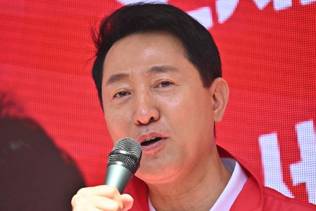 Mayoral candidate Oh Se-hoon of the People Power Party speaks during a political rally ahead of the upcoming local elections in Seoul on May 22, 2026. (Photo by Pedro PARDO / AFP)