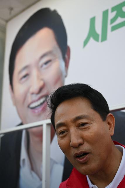 Mayoral candidate Oh Se-hoon of the People Power Party attends a political rally ahead of the upcoming local elections in Seoul on May 22, 2026. (Photo by Pedro PARDO / AFP)