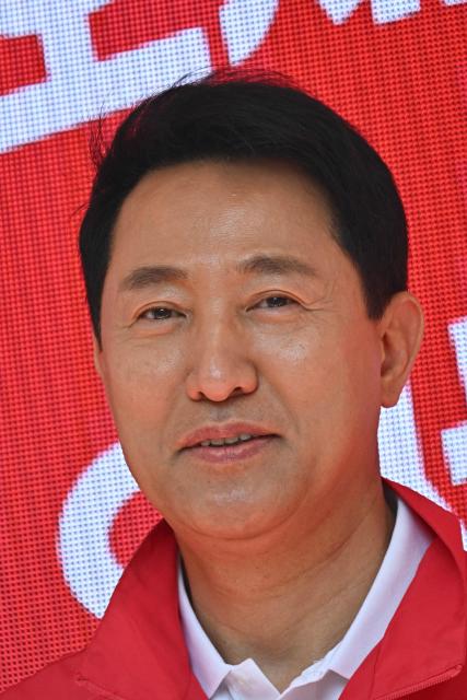 Mayoral candidate Oh Se-hoon of the People Power Party attends a political rally ahead of the upcoming local elections in Seoul on May 22, 2026. (Photo by Pedro PARDO / AFP)