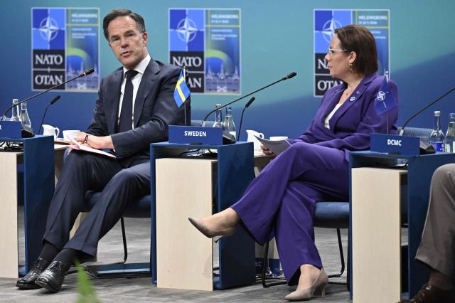 NATO Secretary General Mark Rutte (L) delivers opening remarks next to Sweden's Foreign Minister Maria Malmer Stenergard at the NATO Foreign Ministers' meeting in Helsingborg, Sweden, on May 22, 2026. Foreign ministers of the 32 NATO member states gathered in the Swedish city to finalise preparations for the upcoming Ankara Summit. (Photo by Johan NILSSON / TT NEWS AGENCY / AFP) / Sweden OUT