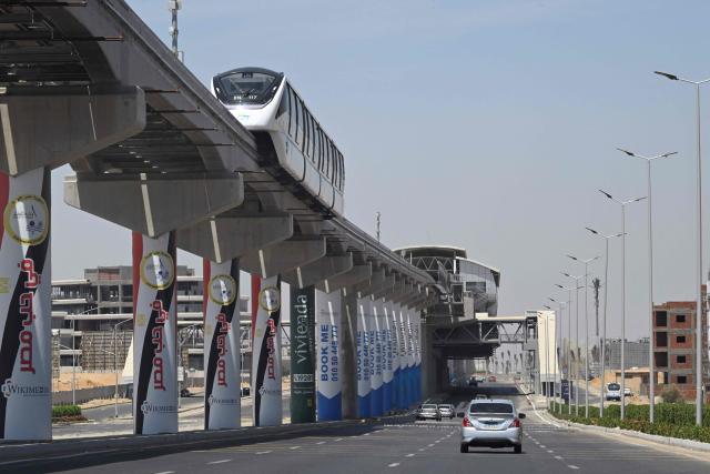 Monorail train that recently opened, operates in the Fifth Settlement east of Cairo on May 22, 2026, as part of the government mega projects and efforts to expand green mass transit. (Photo by Khaled DESOUKI / AFP)