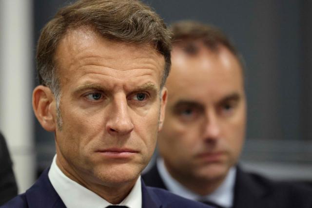 France's President Emmanuel Macron looks on during a visit to the European Forum on Computing Power, Quantum Sciences and Technologies, and Semiconductors at the Very Large Computing Centre of the French Alternative Energies and Atomic Energy Commission (CEA) in Bruyeres-le-Chatel, south of Paris on May 22, 2026. (Photo by Ludovic MARIN / POOL / AFP)