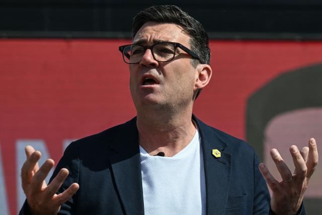 Greater Manchester Mayor Andy Burnham speaks at the launch of his by-election campaign in Ashton-in-Makerfield, west of Manchester in north-west England on May 22, 2026. The Makerfield by-election, expected in mid-June at the earliest, may see Burnham return to the government though he would face a tough fight from the poll-topping Reform UK. (Photo by Paul ELLIS / AFP)