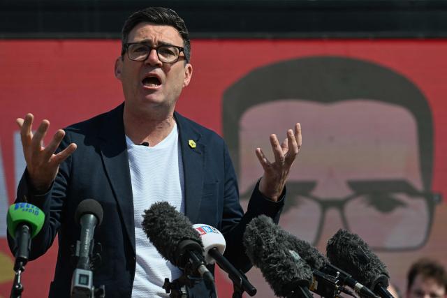 Greater Manchester Mayor Andy Burnham speaks at the launch of his by-election campaign in Ashton-in-Makerfield, west of Manchester in north-west England on May 22, 2026. The Makerfield by-election, expected in mid-June at the earliest, may see Burnham return to the government though he would face a tough fight from the poll-topping Reform UK. (Photo by Paul ELLIS / AFP)